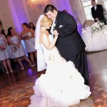 A bride and groom sharing their first dance.
