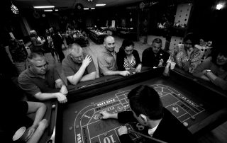 A group of people playing a game of roule.